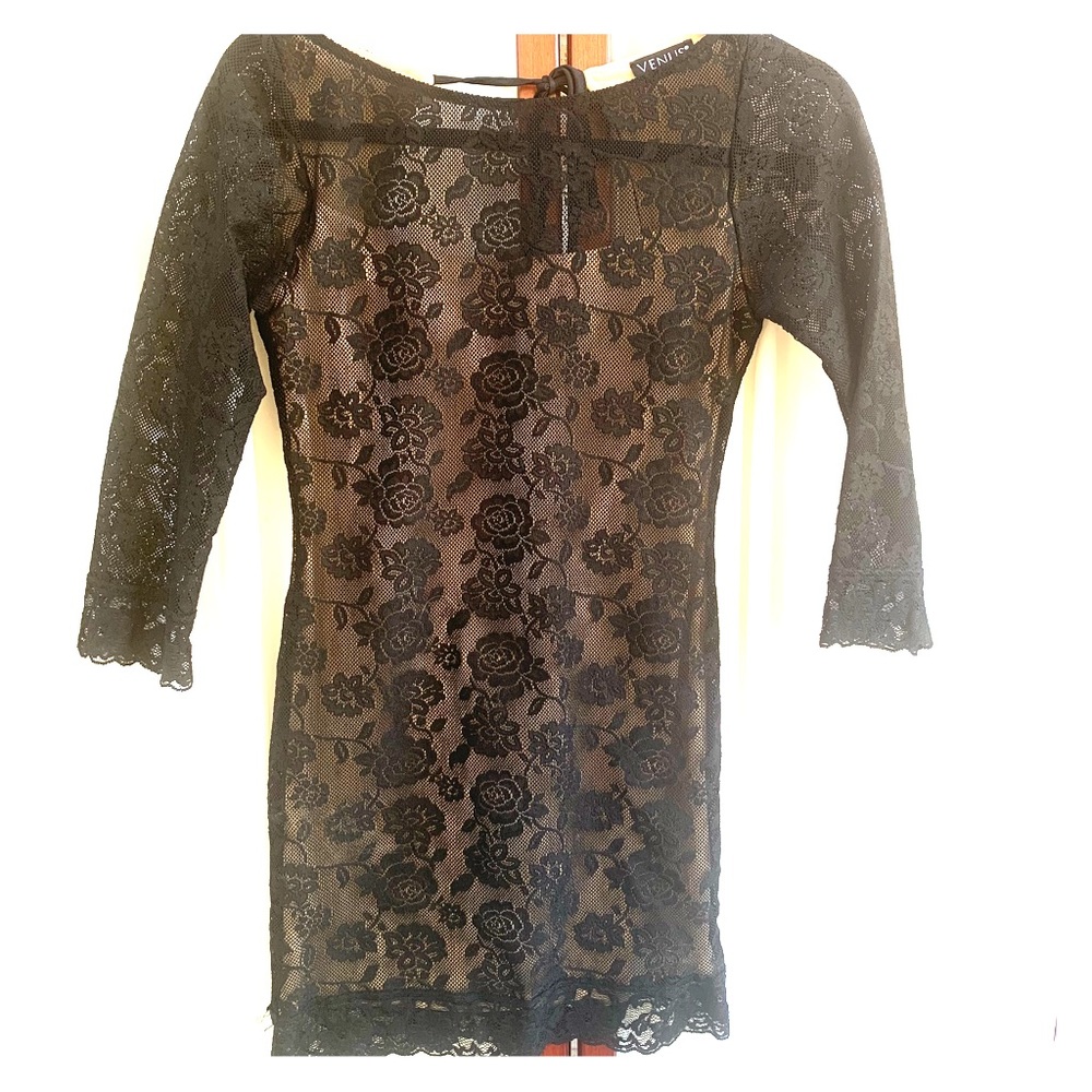 Black lace mini dress with nude slip